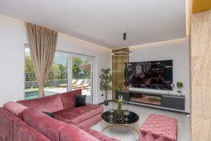 Χώρος καθιστικού στο Luxury Villa Hedonica