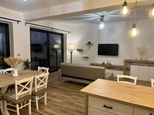 a living room with a couch and a table at Al Vicolo Stretto in Brancaleone Marina