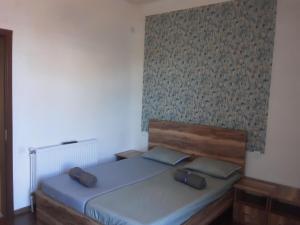 Letto o letti in una camera di Guest House Buche 219