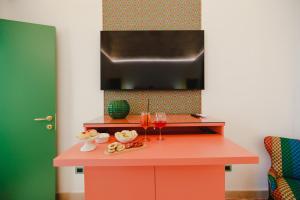 TV a/nebo společenská místnost v ubytování Incentro Domus