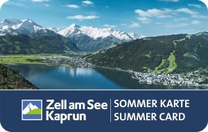 a view of a lake with mountains in the background at Chalet Zell by Chalet Alp Lux in Zell am See