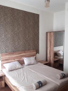 Letto o letti in una camera di Guest House Buche 219