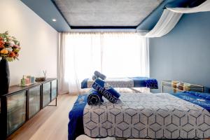 Postel nebo postele na pokoji v ubytování Gran Hotel Las Fuentes