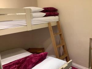 Ένα ή περισσότερα κρεβάτια σε δωμάτιο στο Apple Tree Corner