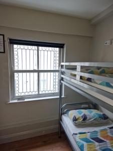 Ліжко або ліжка в номері Bru Bar & Hostel