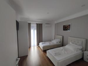 Postel nebo postele na pokoji v ubytování Unique + 7 fotografií