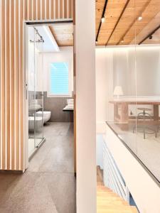 a bathroom with a sink and a toilet in a room at ALC1 Ampio appartamento 4 persone in San Giovanni in Marignano +32 photos