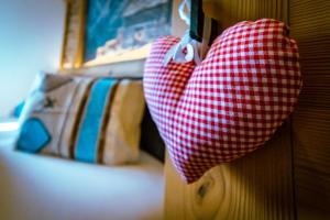 Voodi või voodid majutusasutuse Almgasthaus Glocknerblick toas