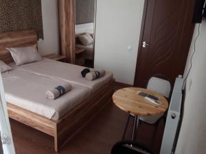 Letto o letti in una camera di Guest House Buche 219