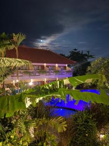 a view of the resort from the garden at night at Marine Bay Sanur in Sanur