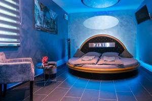 Postel nebo postele na pokoji v ubytování Hotel Platin