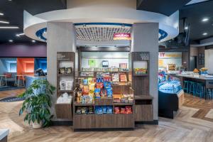 a grocery store with a display of food at Tru By Hilton Knoxville North I 75 in Knoxville