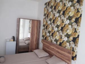 Letto o letti in una camera di Guest House Buche 219