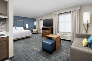 Homewood Suites By Hilton Denver Airport Tower Road客房内的一张或多张床位