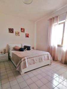 Postel nebo postele na pokoji v ubytování B&B Orizzonte Blu