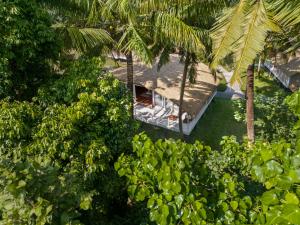 an overhead view of a resort with palm trees at Taj Exotica Resort & Spa, Andamans in Havelock Island