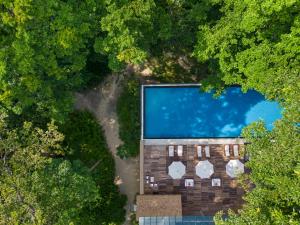 an overhead view of a building with a swimming pool at Taj Exotica Resort & Spa, Andamans in Havelock Island