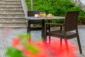 Nápoje v ubytování Suàn Hotel