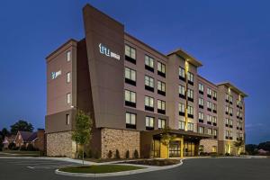 a rendering of a hotel with a building at Tru By Hilton Hershey Chocolate Avenue in Hershey