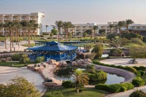 a resort with a fountain and a water park at Palm Royale Resort - Soma Bay in Hurghada