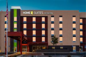 a building with a home and suites sign on it at Home2 Suites Bakersfield in Bakersfield