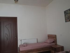Letto o letti in una camera di Guest House Buche 219