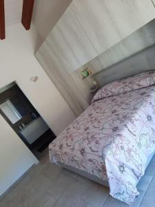 Postel nebo postele na pokoji v ubytování VILLA MILLEFIORI