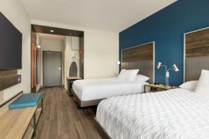 Tru By Hilton Longview客房内的一张或多张床位