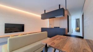 Telewizja i/lub zestaw kina domowego w obiekcie Stock & Stein Lodges