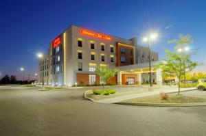 a building with a sign on the side of it at Hampton Inn & Suites Portland West in Portland