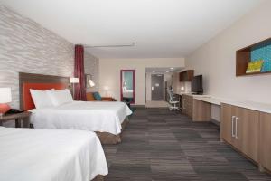 Home2 Suites By Hilton Omaha Un Medical Ctr Area客房内的一张或多张床位