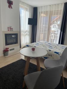 A seating area at Studio Chalet 13, St John Park Bansko