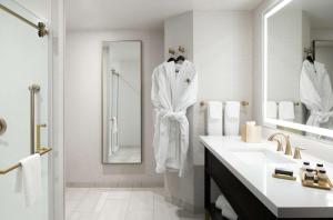 A bathroom at The Axis Moline Hotel, Tapestry Collection By Hilton