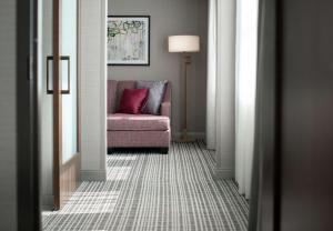 A seating area at The Axis Moline Hotel, Tapestry Collection By Hilton