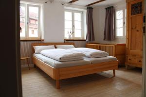 Ein Bett oder Betten in einem Zimmer der Unterkunft Jelängerjelieber