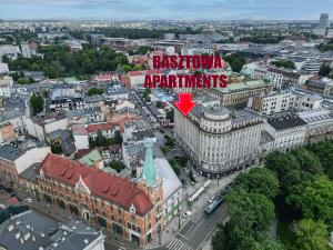 an aerial view of a city with a sign on a building at Basztowa Apartments in Kraków