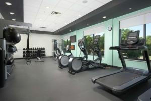 a gym with several treadmills and elliptical machines at Home2 Suites By Hilton Atlanta Nw/Kennesaw, Ga in Kennesaw