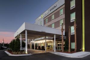 a rendering of the front of a hotel at Home2 Suites By Hilton Jacksonville Airport in Jacksonville