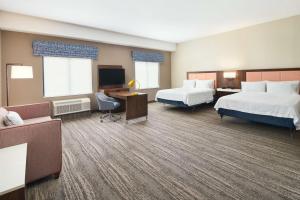 Hampton Inn Clewiston客房内的一张或多张床位