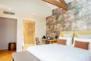 Boutique Hôtel Villa Fabulite客房内的一张或多张床位