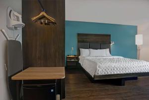 Tru By Hilton Knoxville West Turkey Creek客房内的一张或多张床位