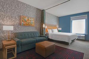 Home2 Suites By Hilton Tracy, Ca客房内的一张或多张床位