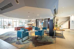 Posezení v ubytování Roomingtons Kaiserhof Landshut