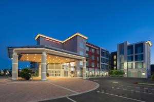 a rendering of a hotel with a parking lot at Hampton Inn & Suites Gilroy, Ca in Gilroy