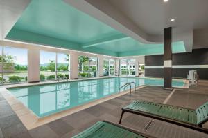 a large swimming pool in a building at Tru By Hilton Ringgold, Ga in Ringgold