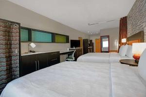 Home2 Suites By Hilton Yuma Pivot Point客房内的一张或多张床位