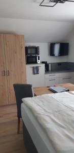 Kuchyň nebo kuchyňský kout v ubytování Haus Beutle