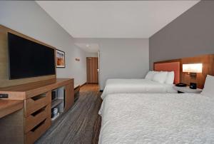 Postel nebo postele na pokoji v ubytování Hampton Inn Midland South, Tx