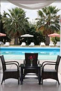 The swimming pool at or close to Rhodian Sun Hotel