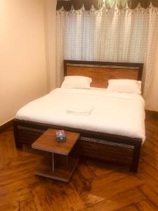 Llit o llits en una habitació de Hotel 99#
